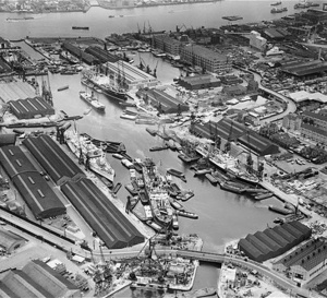 Greenland Dock, left and South Dock, top right, in 1958. Note the mobile cranes, the tracks for which survive today.